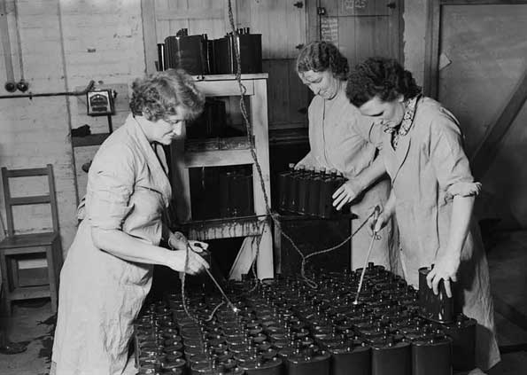 'Women electroplating army canteen bottles', 1940s