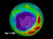 Why is the ozone hole bigger in the less polluted southern hemisphere?