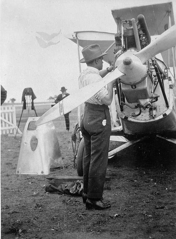 Bert Hinkler servicing his aeroplane, 1928