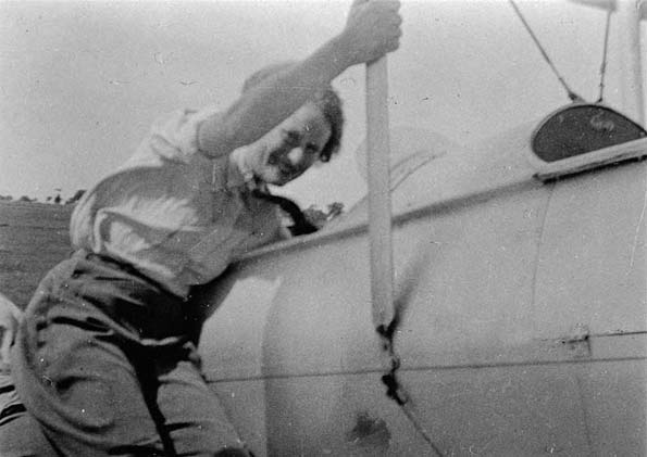 'Nancy Bird Walton with her plane, Gypsy Moth, 1935'