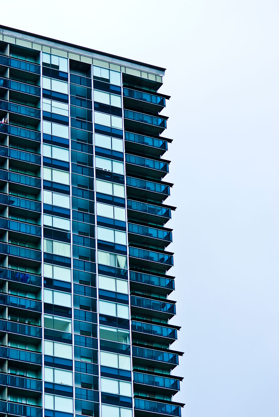 Top and side of high-rise apartment building