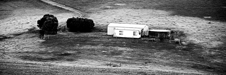 Aerial view of farmer's house in a paddock